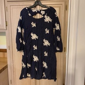 Blue dress with knitted floral accents